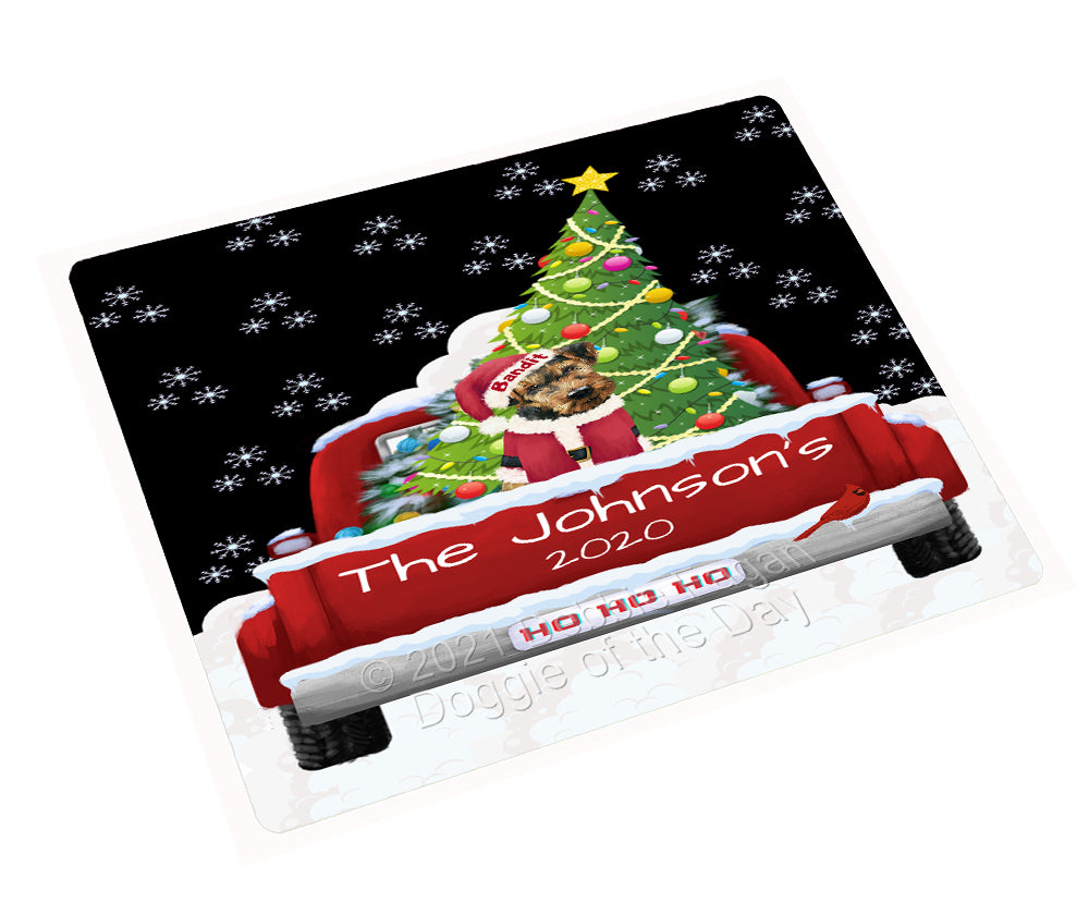 Personalized Travlin' Home for the Holidays Red Truck Airedale Dog Cutting Board CBPERZ48007